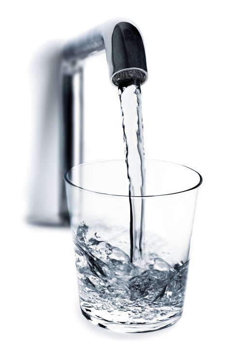Water faucet filling water glass