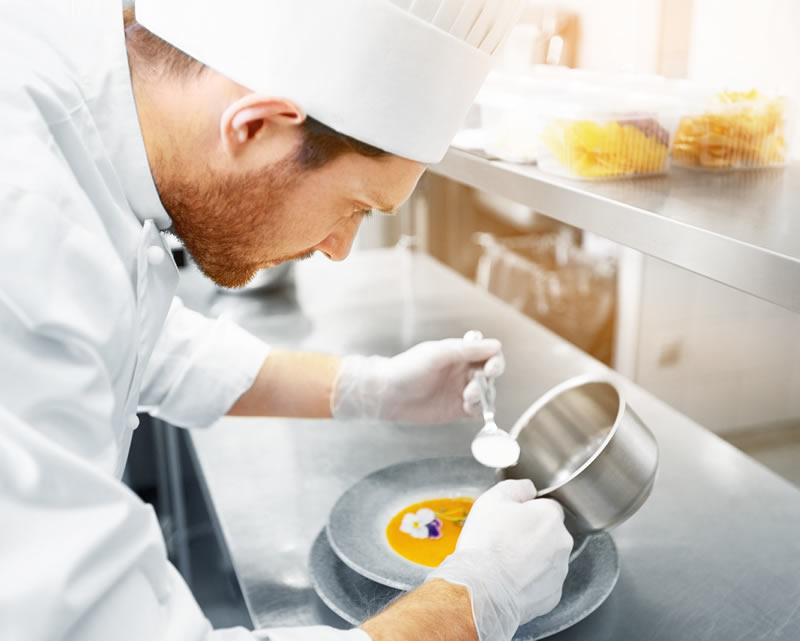 Chef preparing sauce