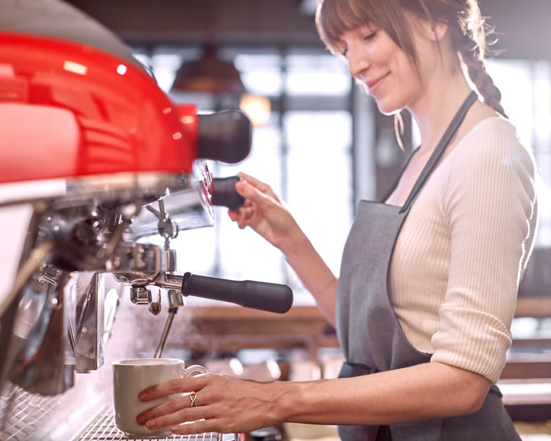 Woman coffee barista